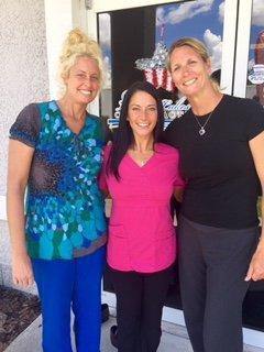 Office Manager Emily,  Massage therapist Lizzy, and Dr. Leslie Horne