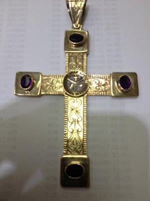 10kt yellow gold 3 1/2" bishop cross with oval amethyst stones.
 this cross also comes in 
 10kt yellow or white gold.
 925 silver