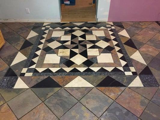 Custom granite, slate, and marble mosaic