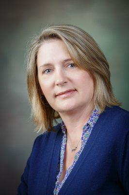 Studio headshot of woman