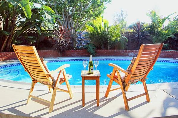 Tropical yard with pool, perfect for relaxing after a long day at Disneyland!