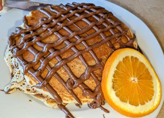 Nutella Pancakes $13.95 (3 huge pancakes)