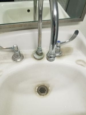 A very Dirty sink Call us if your tiered of looking at a sink this dirty sink I will make it white again.