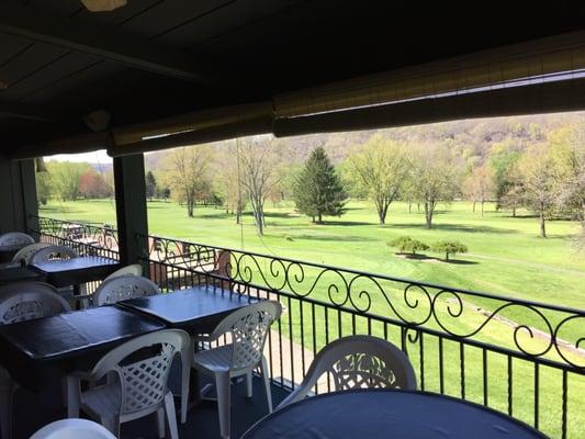 Balcony seating with golf course view