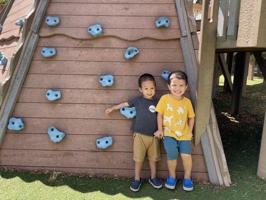 Welcome to Aikahi Elementary School Park! Alika and Tai by the rock climbing wall