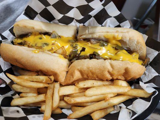 Steak and cheese sub made with Cheez Whiz, like in Philadelphia!! Comes with fried onions and peppers and fries.