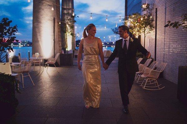 Charlotte & James from Australia celebrate under a canopy of our signature white elegant string lights at the Standard Hotel.