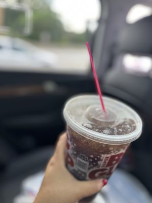 My big gulf with a coffee straw  because they are out of straws