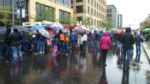 Crowd and lines in the rain.