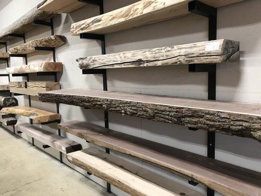 Selection of reclaimed beam and live edge mantels at the Leesburg store.