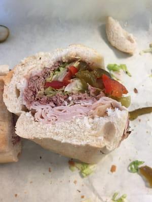 Roast beef and turkey sub with sweet peppers