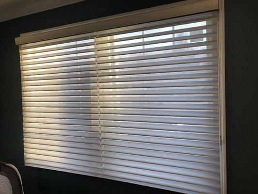 Translucent sheer fabric vanes of Shangri-La® Sheer Window Shadings can be positioned fully open fully closed anywhere in between