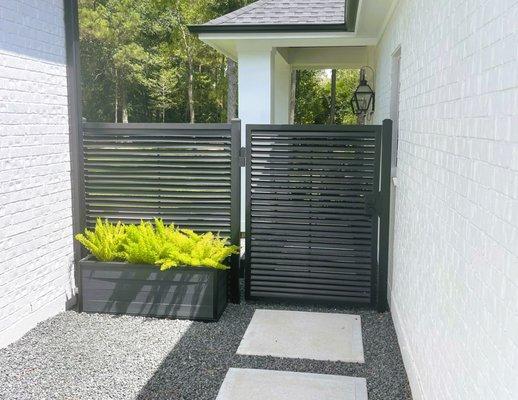 CUSTOM FABRICATED MODERN HORIZONTAL PEDESTRIAN GATE WITH MATCHING FENCE PANEL, BUILT AND INSTALLED SENTRY FABRICATION TEAM.