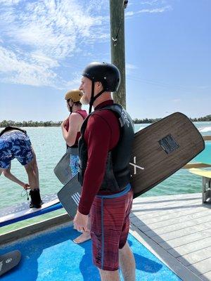 Wakeboard rental, vest and helmet.