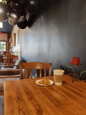 Hot chocolate and house made chocolate chip cookies.