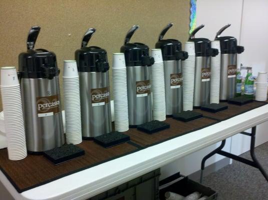 Air pots at a complimentary coffee tasting.