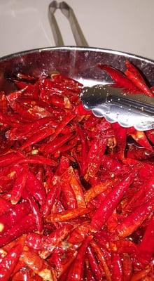 Cooking Hot Chile Peppers. We Sell Juans Heat @SoulardMarket