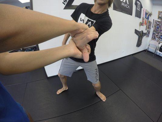 Wrist Lock after a shirt/chest grab.