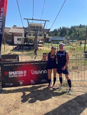 Corinna and Mike Summers in 2021 doing a Spartan in Utah.  It was a hot day and they sure did suffer to get to the finish line.