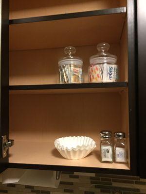 Cabinet with sugar, salt, and pepper