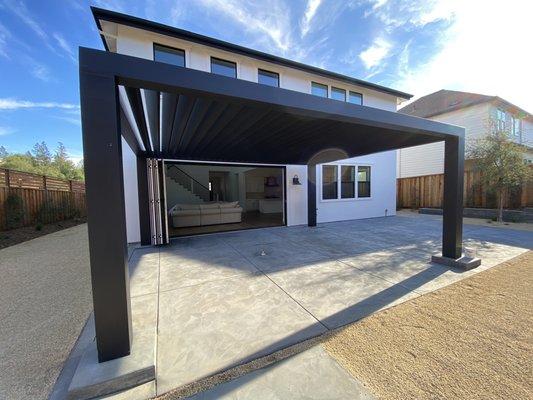 Brushed concrete patio, pergola