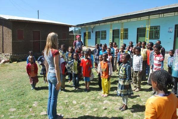 Kate playing a game with kids during the Tapestry Church Ethiopia Trip 2012.