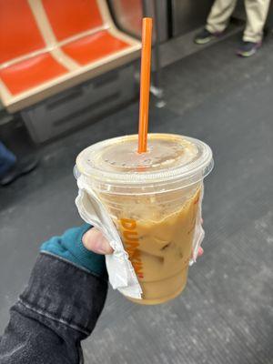 Iced coffee with 2 caramel swirl and 4 milks