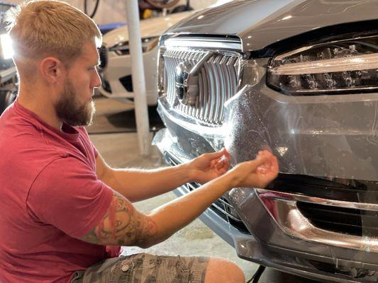 Jeff from ShineWorks installing PPF on my Volvo XC90