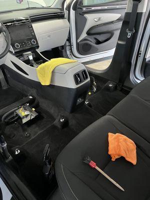 Seat removal and carpet shampoo with extraction