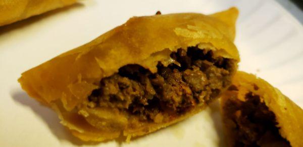 A look in the Qeema samosa, crunchy shell with seasoned ground beef, nice.