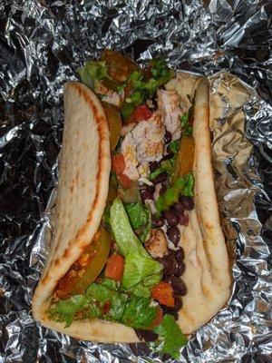 Grilled chicken chalupa, black beans, pico, salsa Verde and jalapenos