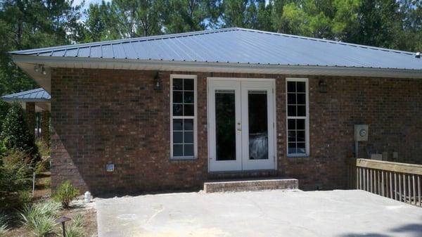 Renovated back yard complete with new double doors to patio.