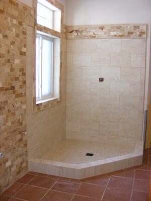 Remove a tub or tub deck to create a large showerstall