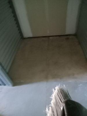 My storage unit and my broom, purchased with receipt in the same area before arriving.