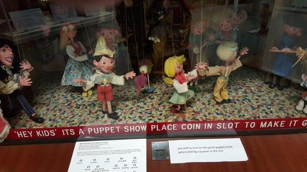 Coin operated puppet theater