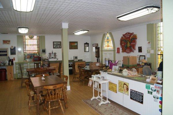 Checkout counter and café seating.