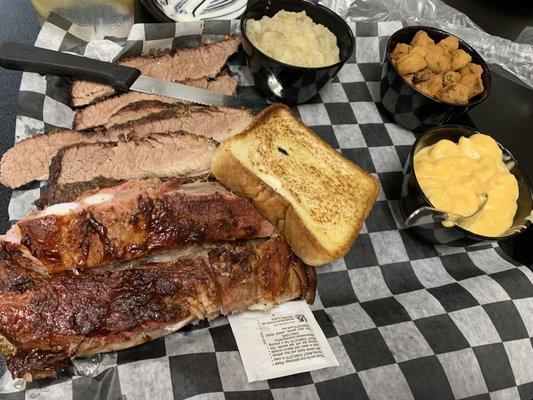 Ribs, sliced brisket, mashed potatoes, Mac n cheese, fried okra.