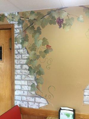 Faux bricks and grape vines in a restaurant