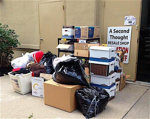 Donations drop off in the back of building behind store's new location in Piano Works mall.