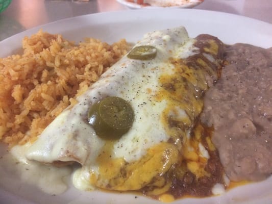 Chicken and cheese enchiladas. Cheese was ordered with queso on top....?