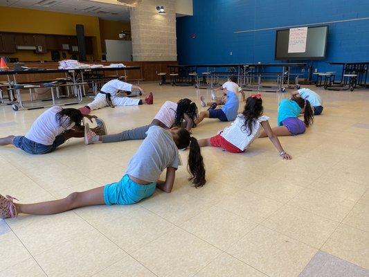 Stretching before class