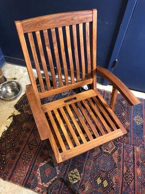 Restored teak patio chairs.