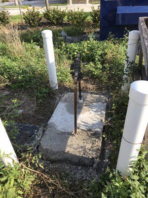 Exterior backflow device & new water pipes with new concrete pad