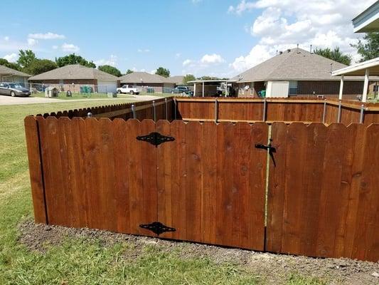 4-foot pre-stained wood privacy fence in Denton.