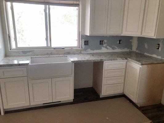 Kitchen farm sink.  The Marble Master did real nice curved edging on the sink.