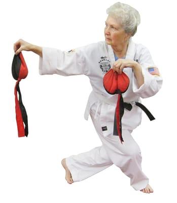 A 77 year old student practices Nae Gong techniques to develop internal strength.