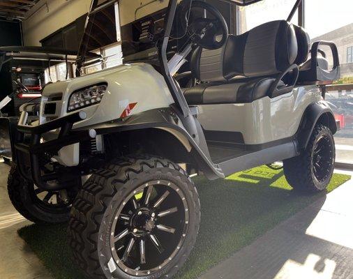 New Lifted Club Car Pearl White Lithium-ion ONWARD with Brush Guard, Fender Flares, Lights, plus many extras