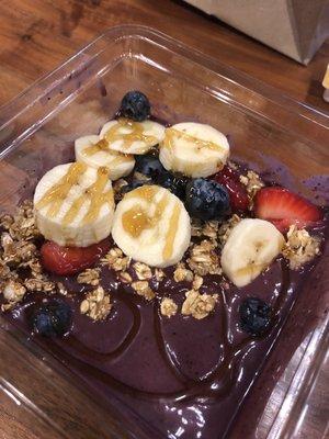 Açaí bowl to go. Don't be fooled aside from fresh fruit it was tasteless and melted. Ugh. $9