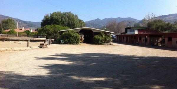 main barn and in-and-out stalls. There are two additional 4-horse barns on the other end of the property.