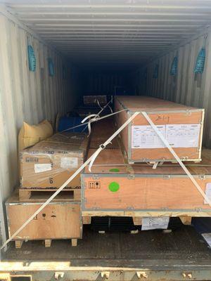 Transloading oversized crates to be delivered on a flatbed